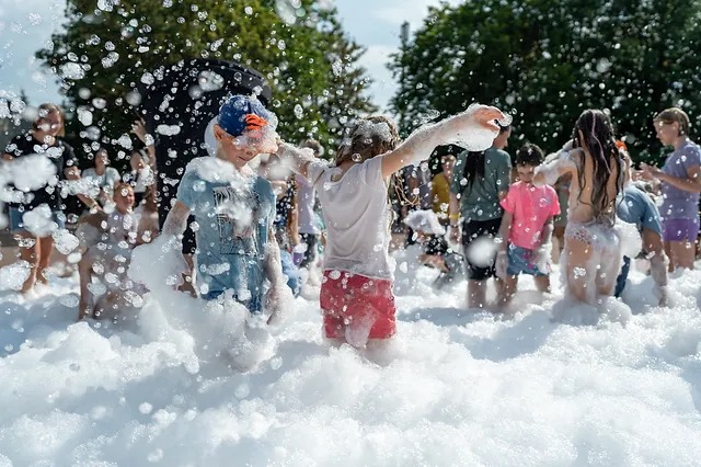 Children among the foam